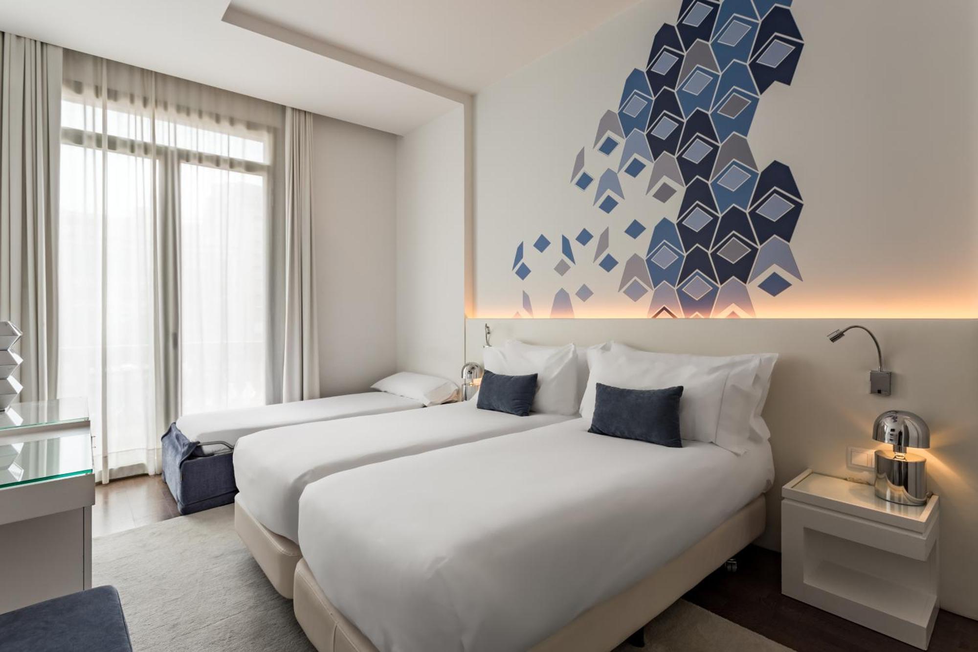 Quarto com Cama de Casal ou 2 de Solteiro e Cama Extra
