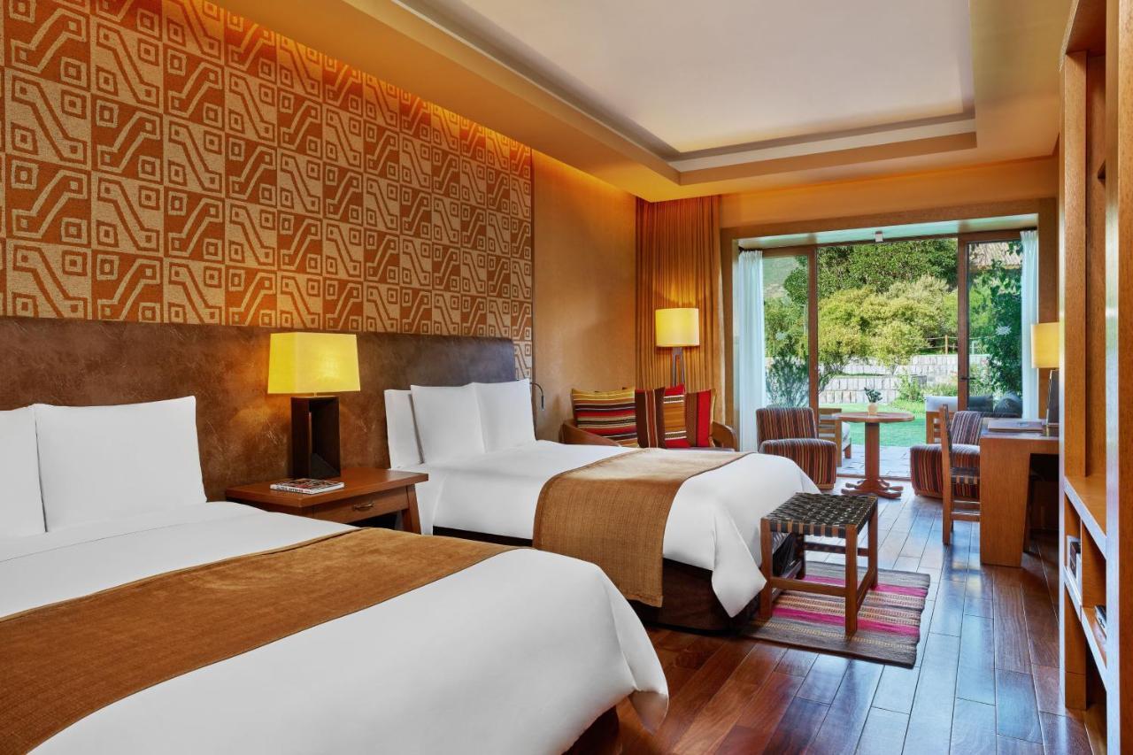 Habitación Grand Deluxe con dos camas grandes y terraza