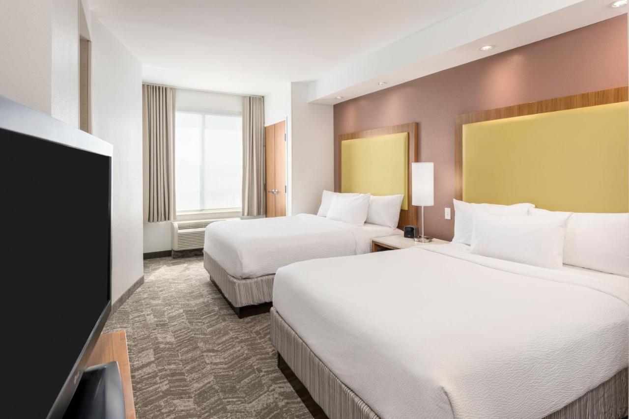 Queen Suite with Two Queen Beds and Sofa Bed