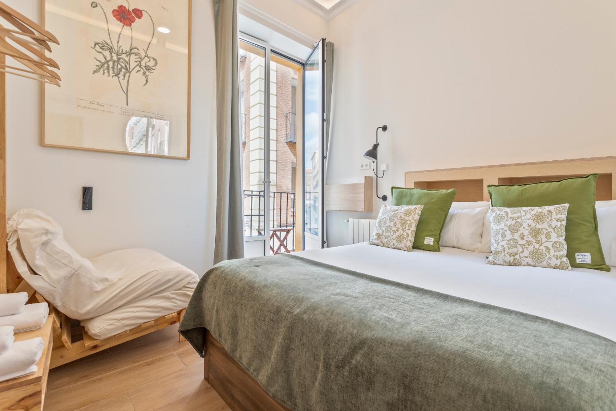 Habitación Doble con balcón (3 adultos)