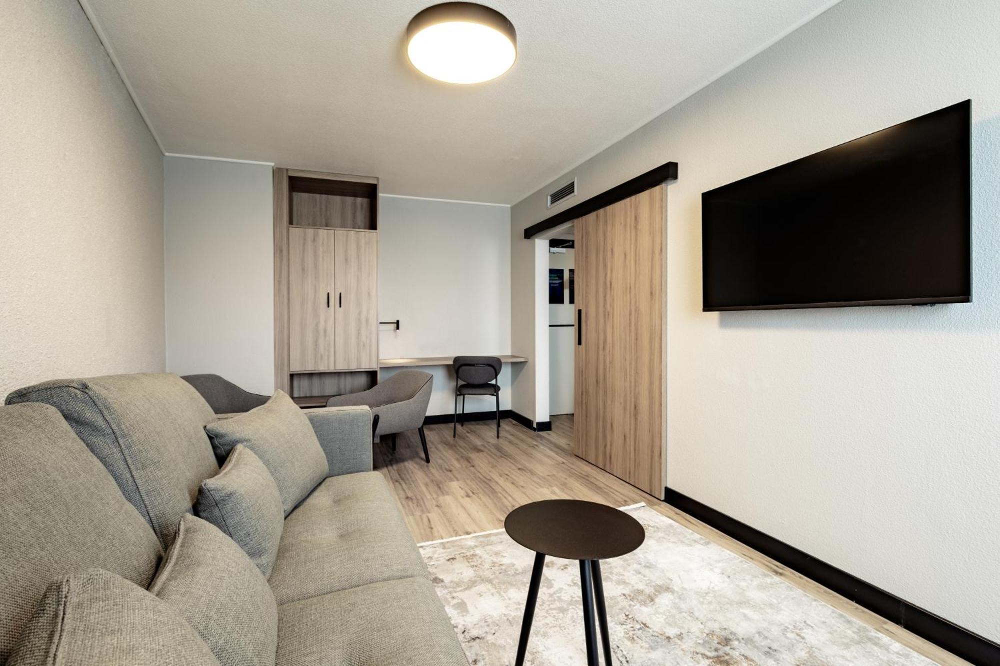 Junior Suite One Queen Bed One Double Sofa Bed