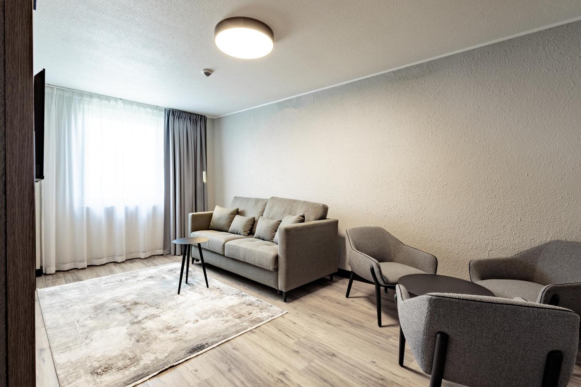 Junior Suite One Queen Bed One Double Sofa Bed