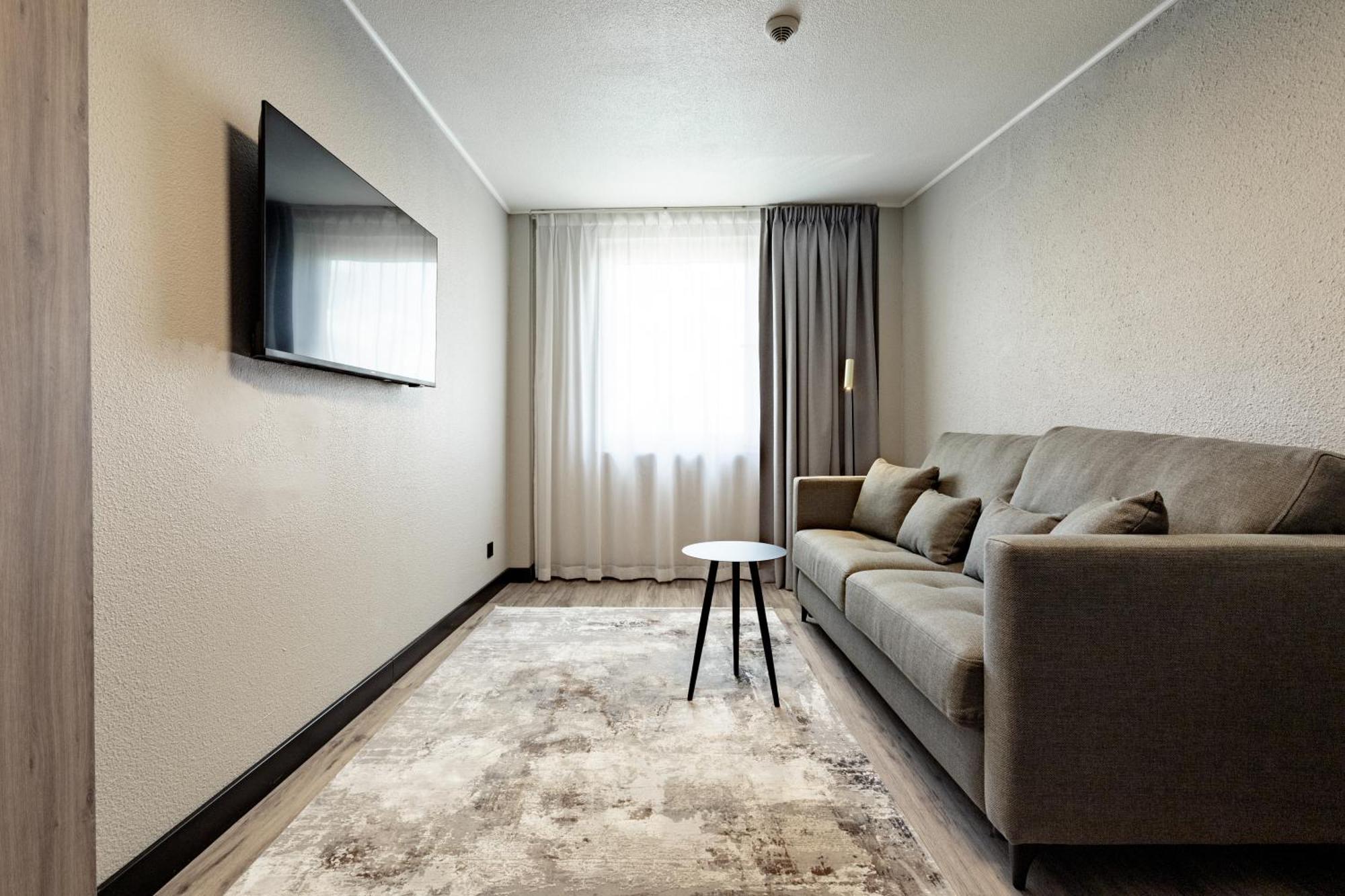 Junior Suite One Queen Bed One Double Sofa Bed