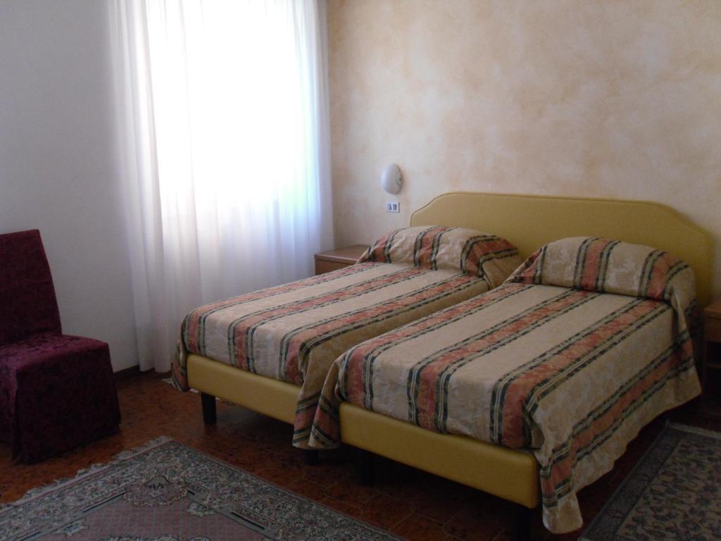 Camera Doppia con Letti Singoli