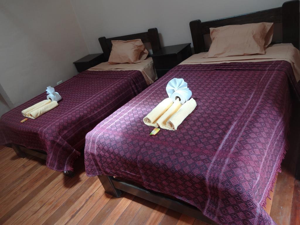 Quarto Standard com 2 Camas de Solteiro e Banheiro Compartilhado