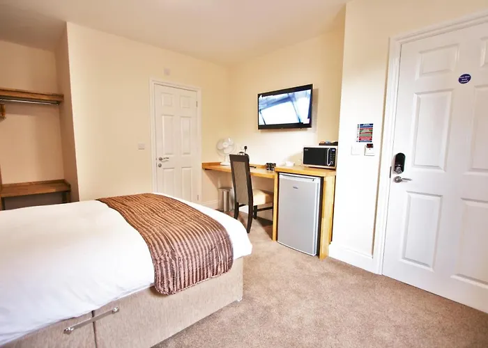 New County Hotel & Serviced Apartments By Roomsbooked