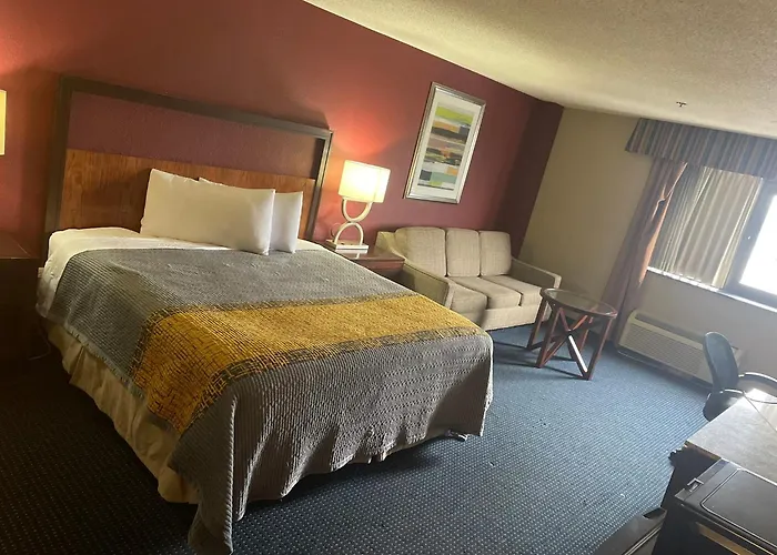 Apm Inn & Suites