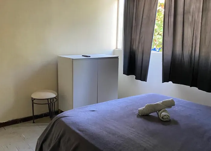 Quarto simples no centro