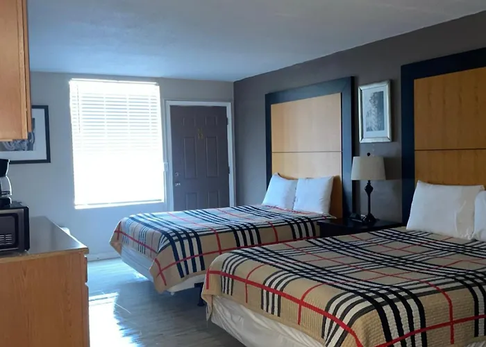 Apm Inn & Suites