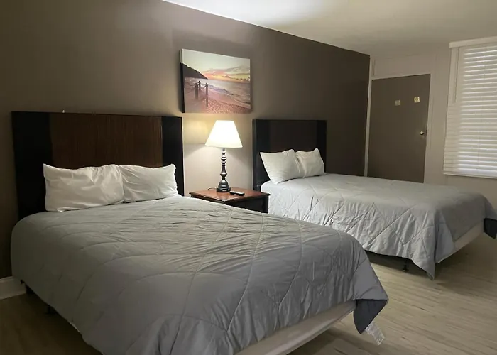 Apm Inn & Suites